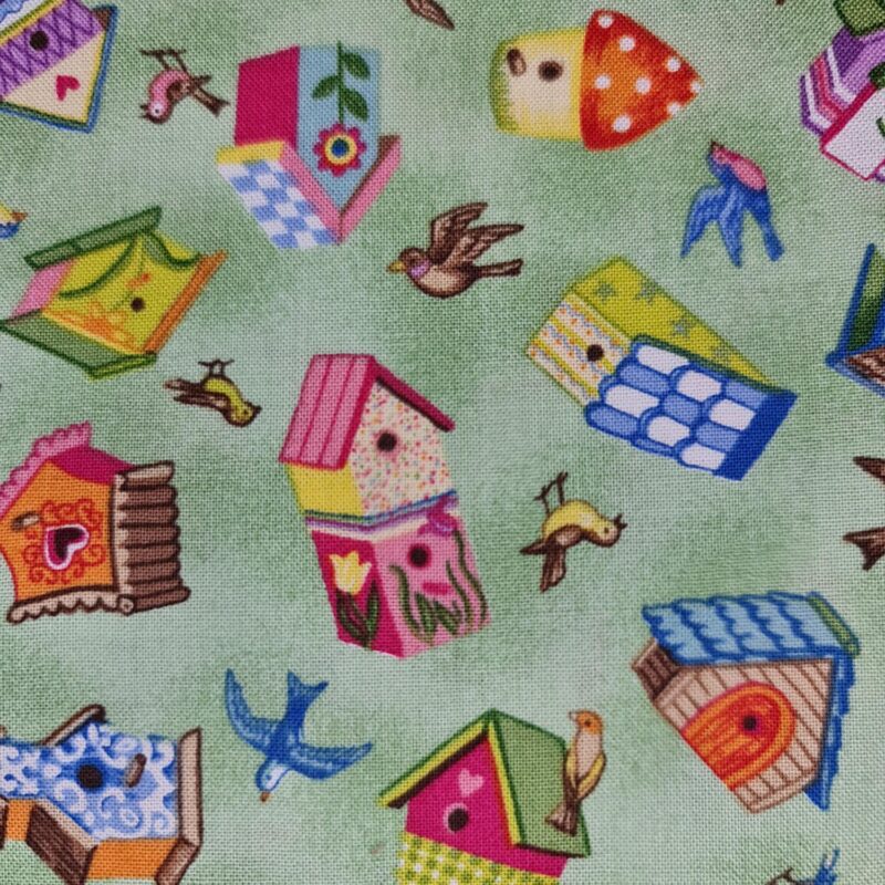 Tecido gaiolas e pássaros coloridos